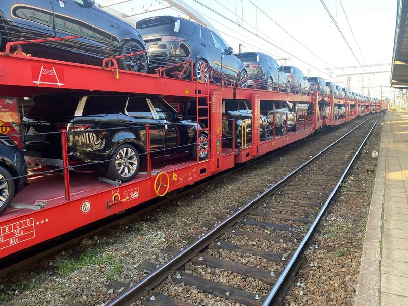 New cars in a traffic jam before delivery